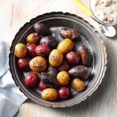 an image of potatoes in a bowl on a table with the words potato potatoes written below it