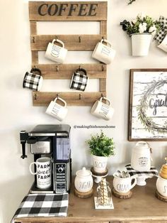 a coffee bar with cups hanging on the wall