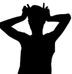 the silhouette of a man holding his hands to his head with one hand while standing in front of him