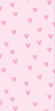 a pink background with hearts on it