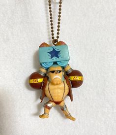 a necklace with a cartoon character on it