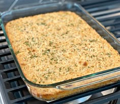 a casserole dish is being cooked on the grill