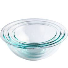 stack of glass bowls with lids on white background