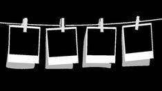 four blank photos hanging on a clothes line