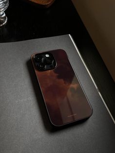 an iphone 11 pro sitting on top of a table