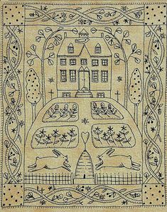 an embroidered wall hanging with a house and trees on it