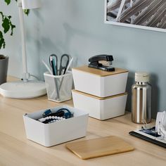 the desk is clean and ready to be used as an office supplies holder for pens, pencils, and telephones