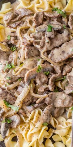 pasta with meat and sauce in a bowl