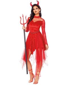 a woman in a devil costume holding a pitchfork