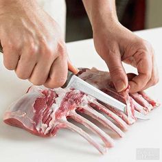 a person cutting up meat with a knife