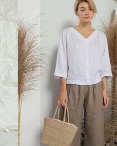 Simply precise and effortlessly elegant linen blouse made from soft linen fabric. Loose, relaxed fit top features deep V neck and dropped shoulders, essential piece in every closet. Skirts Pattern, Linen Camisole, Linen Top Women, Linen Shirts Women, Linen Fashion, Summer Linen, Linen Style, Linen Blouse, Casual Tops For Women