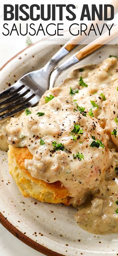 biscuits and sausage gravy on a plate with a fork