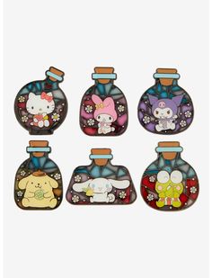 four glass bottles with cartoon characters on them, each containing an animal and cat design