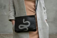 "If you are looking for a unique real leather bag, this is it! This real leather bag is decorated with 100% hand-painted snake. European Adder look original on the black purse. If you would like to receive a bag with a different snake drawn on it, please send me a message ;-) The painting is made of acrylic paints. After drying, the drawing is fixed at high temperature. Therefore, it becomes resistant to moisture and abrasion. In every work of art I put a part of my soul, heart and emotional content. I really like my work, that's why every thing is so special and brings pleasure and positive emotions to its owner. The bag with a zipper. There are 2 zipper pockets in this crossbody bag. The handle of the bag is adjustable with a buckle. Carabiners are easy to unfasten and you get a elegand European Adder, Painted Snake, Painting Women, Real Leather Bags, Black Leather Handbag, Snake Leather, Women Shoulder Bag, Black Purse, Black Leather Handbags