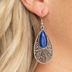 Dotted Filigree Flares Out From The Bottom Of A Blue Cat's Eye Stone, Coalescing Into An Ornate Teardrop Frame. Earring Attaches To A Standard Fishhook Fitting. Teardrop Silver Earrings, Cats Eye Stone, Blue Moonstone, Fish Hook Earrings, Paparazzi Accessories, Eye Earrings, Eye Stone, Blue Cats, Affordable Jewelry