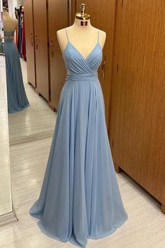 Dusty Blue Chiffon Lace-Up A-Line Long Bridesmaid Dress – Modsele Blue Chiffon V-neck Bridesmaid Dress, Chiffon A-line Bridesmaid Dress For Prom, V-neck Bridesmaid Dress With Ruched Bodice For Prom, A-line Chiffon Dress For Prom Season, A-line Chiffon Dress For Prom, Prom Chiffon Dress With Ruched Bodice, Flowy Evening Dress For Prom, Elegant Chiffon Bridesmaid Dress For Homecoming, Chiffon V-neck Evening Dress With Fitted Bodice