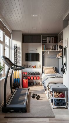 a bedroom with a treadmill, exercise equipment and storage space on the wall behind it