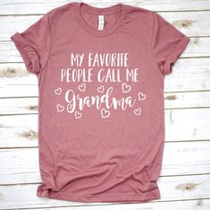 My Favorite People Call Me Grandma Shirt, Shown on a Black Heather shirt with white lettering Shown on a heather black t shirt with white writing. Made of 60% Cotton/40% Polyester Blend Comfortable T shirt Additional sizes are available, just contact me by email and I can get in the size you need. If you could like a different color of lettering please message me with your choice from the colors below: Glitter Colors: Black, Silver, Gold, Red, Blue, Purple, Lavender, Orange, Mint Non-Glitter: Bl Funny T Shirt Sayings, My Favorite People Call Me, Travel Shirts