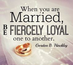 two gold wedding rings sitting on top of a white cloth with the words, when you are married, be fiercely loyal one to another