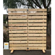 a large wooden fence made out of pallets