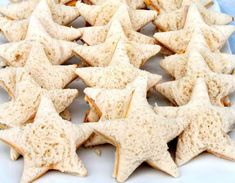 star shaped biscuits are arranged on a white plate