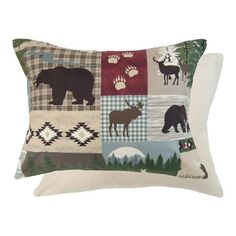 an animal themed pillow with bear, moose, deer and buffalo prints on it's sides