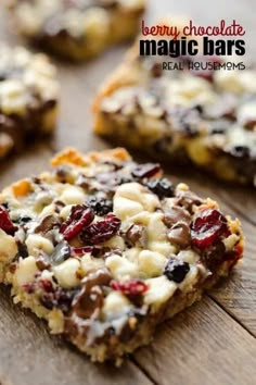 chocolate and cranberry magic bars on a wooden table