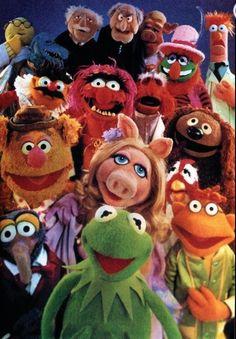 the muppets and miss piggy are posing for a group photo with each other