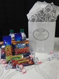 a table topped with bags and candy