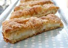 two slices of pie sitting on top of a white plate