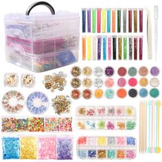 the contents of a craft kit including beads, scissors and other items are shown in this image