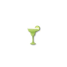 a green margarita sitting on top of a white counter