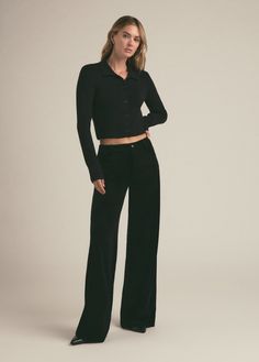 The 90's are back. Only better. There’s a nostalgic fit to the low-rise and wide leg of The Ollie with a baggy, lowrider silhouette. Our favorite detail about these pants, however, is the stretch velvet that elevates the look.92% Polyester, 8% Elastane Machine wash cold Rise / Waist: low rise Hips: loose at hips Leg: baggy leg Average Height: full length (bunches at hem) 11" rise 22.5" knee24" leg opening 32" inseam Megan is 5'10" wearing size 25 Average Height, Low Rise Pants, Black Out, Stretch Velvet, Lowrider, Low Rise, Full Length, Wide Leg, Cute Outfits