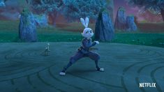 an animated rabbit is standing in the middle of a circular area with trees and rocks