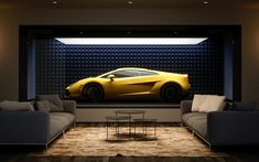 a yellow sports car is on display in the living room