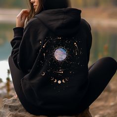 Moon Phase Hoodie Oversized Hoodie, Witchy Clothes, Celestial Sweatshirt, Trendy Aesthetic Pullover Graphic Hoodie, Cottagecore Clothing Hoodie runs a bit on the small side, we recommend sizing up! For that cute OVERSIZED look, please be sure to order one to two sizes up This unisex heavy blend hooded sweatshirt is relaxation itself. Made with a thick blend of cotton and polyester, it feels plush, soft and warm, a perfect choice for any cold day. In the front, the spacious kangaroo pocket adds d Moon Hoodie, Moon Sweatshirt, Masc Cottagecore Sweatshirts & Hoodies, Witchy Hoodie Ideas, Celestial Moon Print Crew Neck T-shirt, Graphic Hoodies, Hoodie Fashion, Style Casual