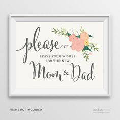 a framed print with the words please leave your wishes for the new mom and dad