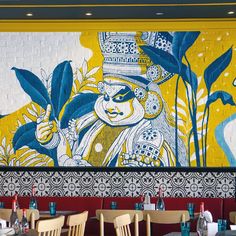 a mural on the wall of a restaurant