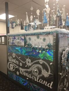 an ice chest decorated with snowflakes and trees