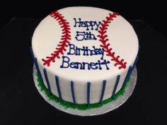 a baseball themed birthday cake with the number five on it