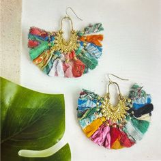 Brand New!! Beautiful Earrings Done In Colorful Layers Of Fringed Kantha Textiles That Form A Fabulous Boho, Statement Earring. Strips Of Fabric Fan Out From An Intricately Handcrafted Metallic Gold Plate. Each Piece Is Made From Recycled Kantha Textiles So The Colors & Patterns Are All One Of A Kind. Measures 2.5” Long With French Earring Wires Sustainably Handmade By Women Artisans. Gold Bohemian Tassel Earrings For Festive Occasions, Bohemian Tassel Earrings For Party, Bohemian Green Chandelier Earrings For Festive Occasions, Bohemian Multicolor Tassel Earrings For Festive Occasions, Bohemian Tassel Earrings With Ear Wire For Party, Bohemian Multicolor Chandelier Earrings For Party, Traditional Tassel Chandelier Earrings For Festival, Bohemian Style Ear Wire Jewelry For Celebrations, Bohemian Green Earrings For Celebration