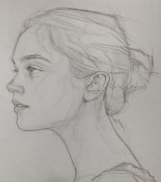 a pencil drawing of a woman's profile