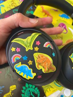 Black sony headphones with colorful glitter dinosaur and stars stickers Dinosaur With Headphones, Dinosaur Aesthetic, Dinosaur Stuff, Dinosaur Stickers, Kid Core, Jurassic Park, Jurassic World, My Vibe, Pretty Cool