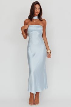 Satin maxi dress Strapless Anti-slip gel on neckline Cowl draped back Built-in bust padding Invisible side zipper No lining Make jaws drop in our gorgeous Damsel maxi dress. It features a low, draped back design and reverse halterneck. It's perfect for a wedding reception or special event. Team it with nude heels and a clutch for an unforgettable look. MODEL INFO Model is wearing size XS Height: 5'10" Bust: 36.0" Waist: 25.5" Hips: 33.0" CARE Hand Wash Cold. Do Not Iron. MATERIAL POLYESTER Long Dresses Silk, Light Blue Backless Dress, Halterneck Bridesmaid Dresses, Bridesmaid Dress Light Blue, Selfie Leslie Dresses, Blue Prom Dress Simple, Sky Blue Formal Dress, Light Blue Silk Dress, Bridget Wedding