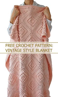 a woman holding up a pink crochet shawl with the text free crochet pattern vintage style blanket