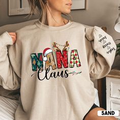 Nanai Claus is a popular Christmas character that your grandma will love. This sweater sweatshirt is perfect for keeping her warm this winter. Add a little bit of fun to your gift-giving with this unique Nana Claus product personalized with grandkids names on sleeve. Your grandma will love wearing her Nana Claus sweatshirt this holiday season. * S I Z I N G * ✺ Sizing is unisex  ✺ For adults, size runs like men's, though not overly large. Most women find their typical size works best, since they are meant to fit a touch loose and go up 1 or 2 sizes if you want the oversized look. ✺ Size guide and fit:  The size chart is listed in photos above.  Please use the measurement for the most accurate sizing. ✺ Product color may slightly vary due to photographic lighting sources or your monitor set Christmas Gifts For Aunts, Auntie Shirts, Aunt Shirts, Personalized Grandma, Nana Gifts, Kids Names, Christmas Mom, Aunt Gifts, Gift For Grandma