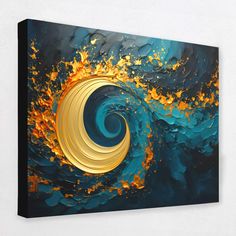 an abstract painting with gold and blue swirls in the center on a white wall