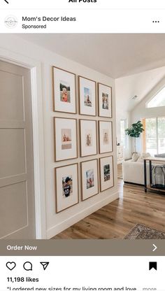 a living room filled with furniture and pictures on the wall