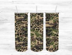 the camo pattern is shown on this pair of oven mitts