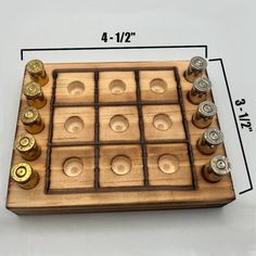 a wooden game board with lots of buttons on it